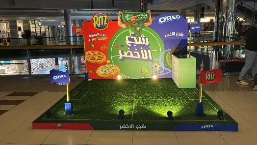 Oreo x Ritz football-themed activation stand in a Saudi mall